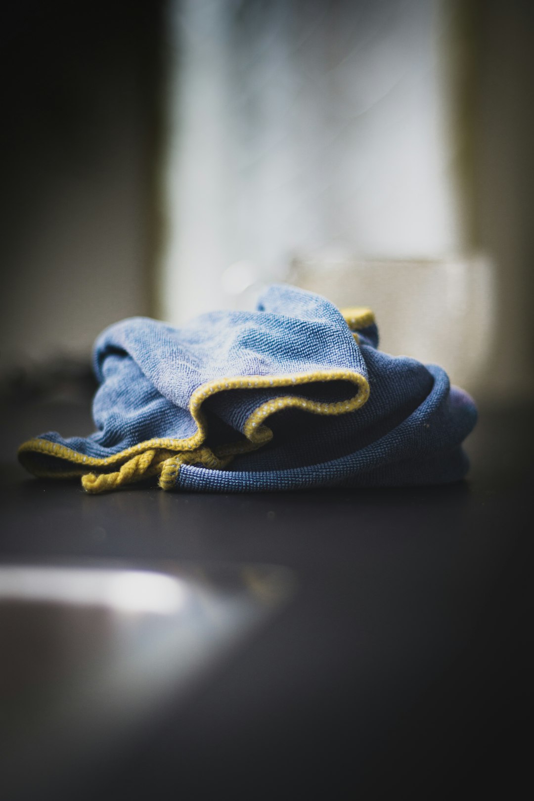 blue-denim-textile-on-black-table-rtdtc6b2-ry